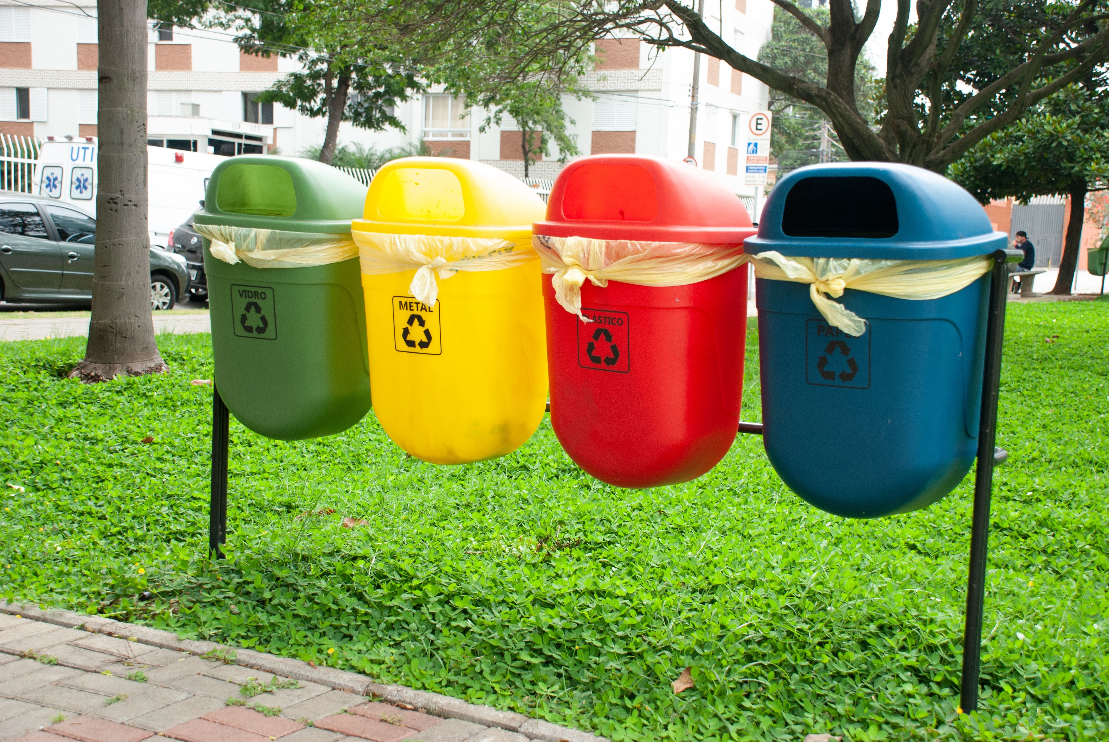 Recycling bins on a street in São Paulo, Brazil.